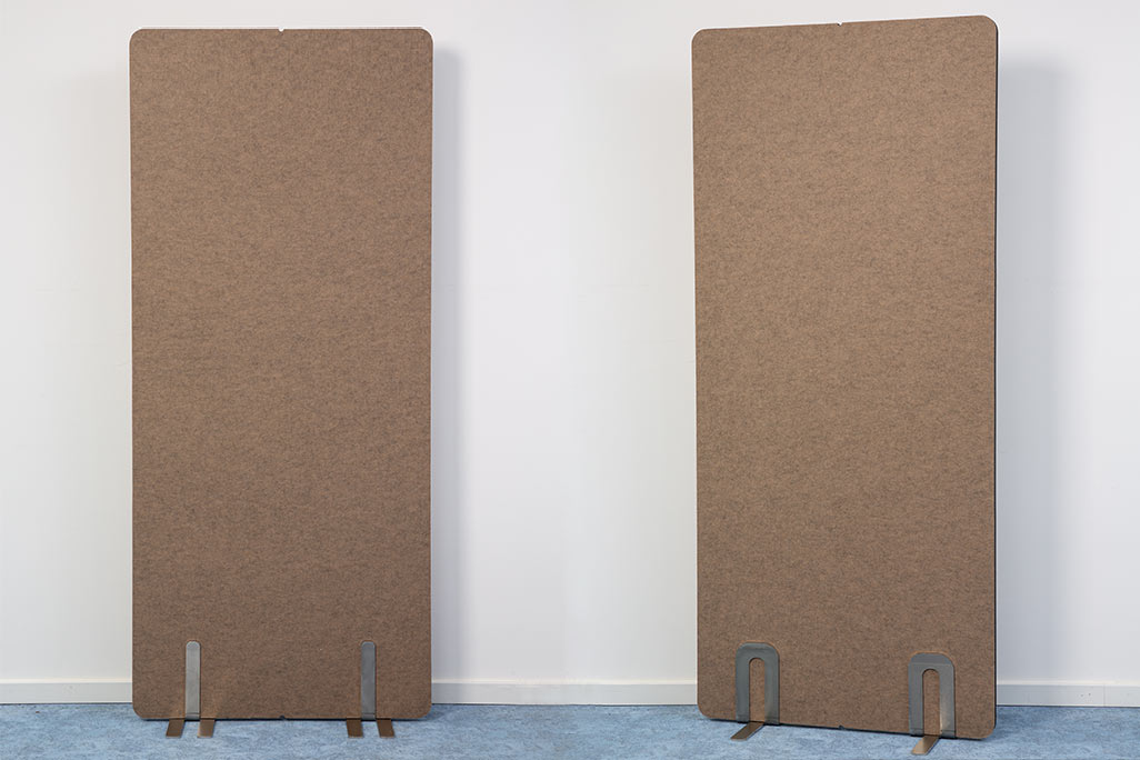 2 soniflex screens next to each other in front of a white wall 2 soniflex screens next to each other in front of a white wall, color beige wall