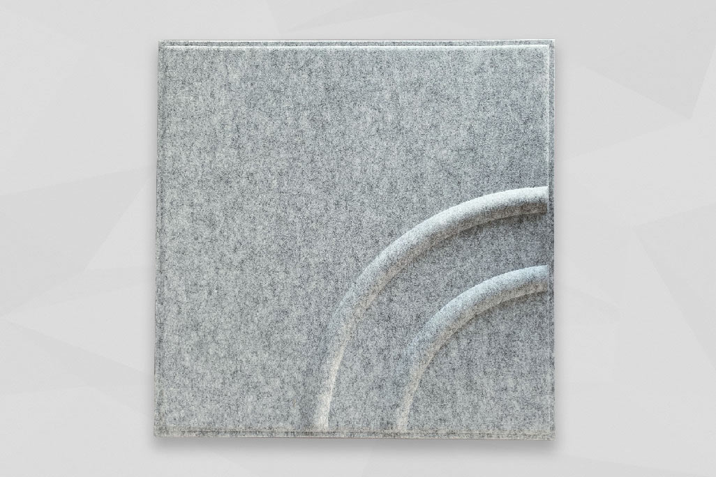 Rectangular grid ceiling insert in light gray soni COLOR design photographed against a gray background
