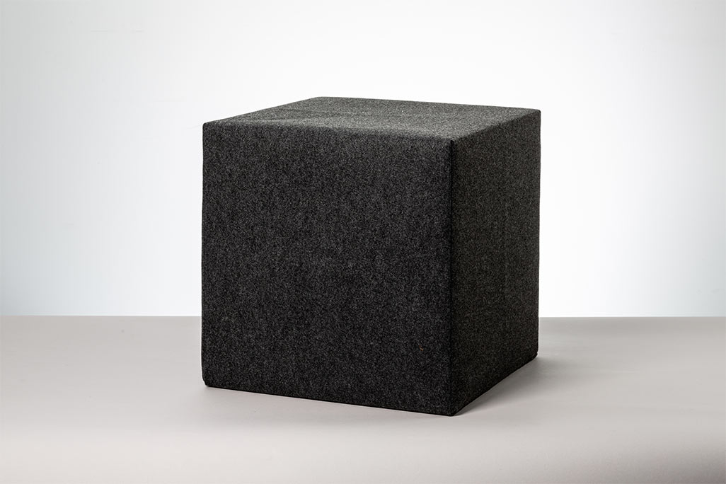 Anthracite-colored seat cube photographed against a white background.