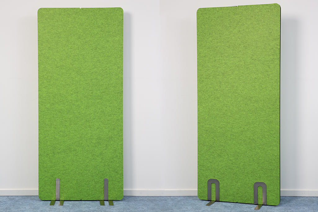 2 partitions from soniflex next to each other in front of a white wall, color green