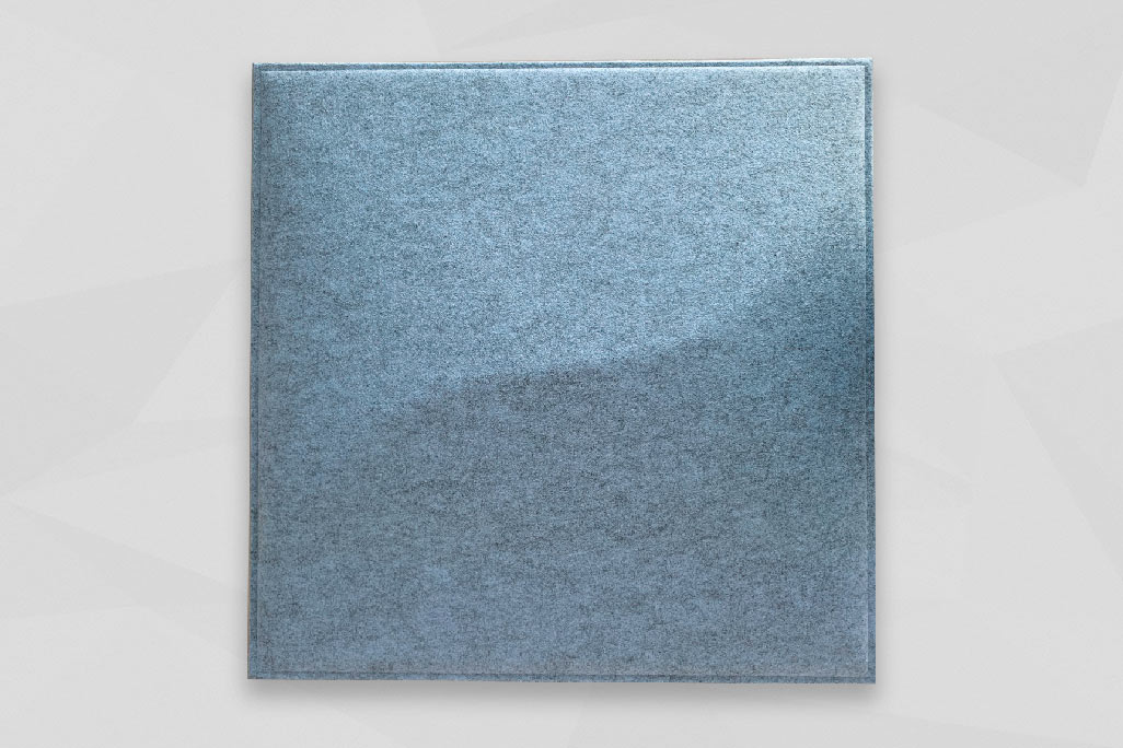 A ceiling element soni COLOR Design YinYang in Balu photographed against a light gray background.